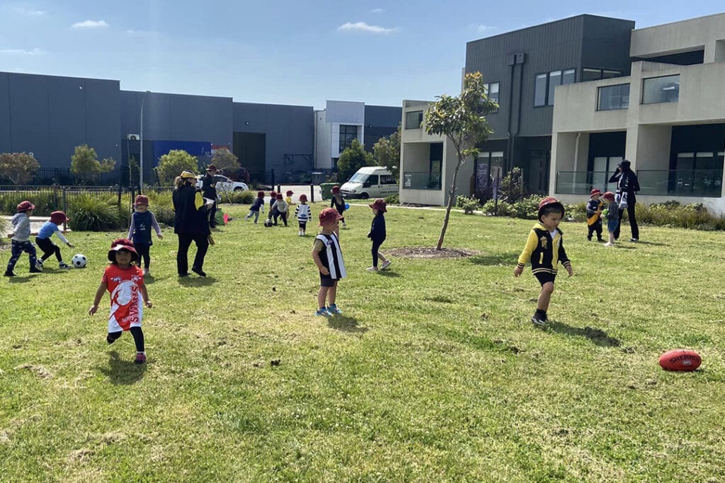 Children playing outdoors at Evans Park Early Learning Centre