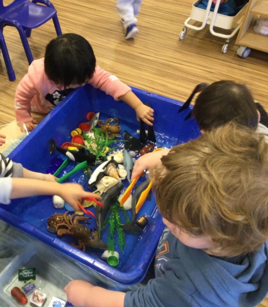 Children enjoying ocean week with water play