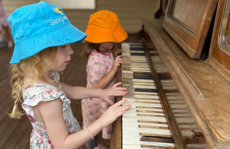 Children playing the piano