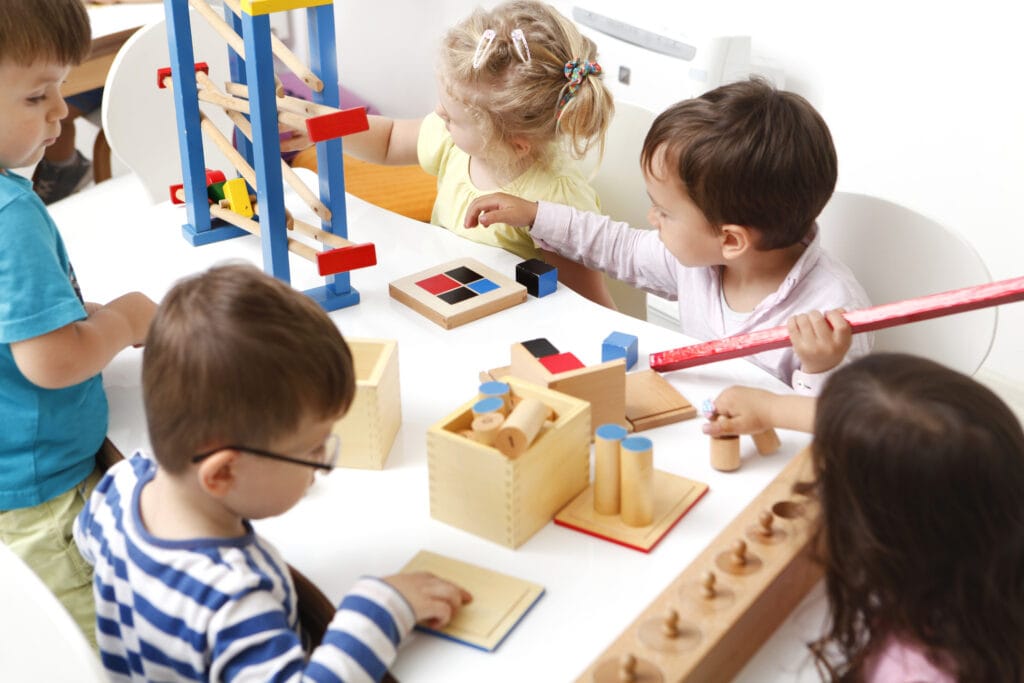 Kindergarten children playing with blocks