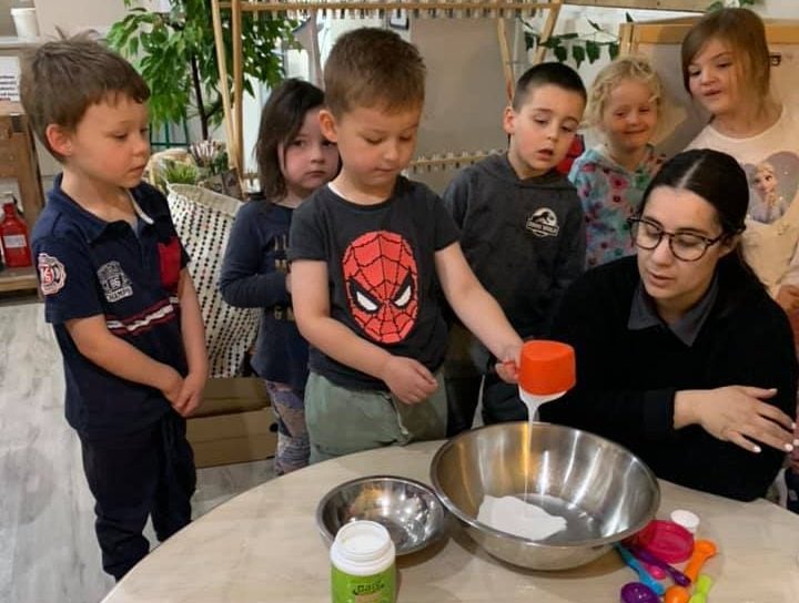 Children making slime at Story House Telford Park